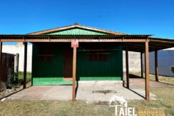 Terreno com Casa de Madeira de BARBADA na Praia de Cidreira/RS